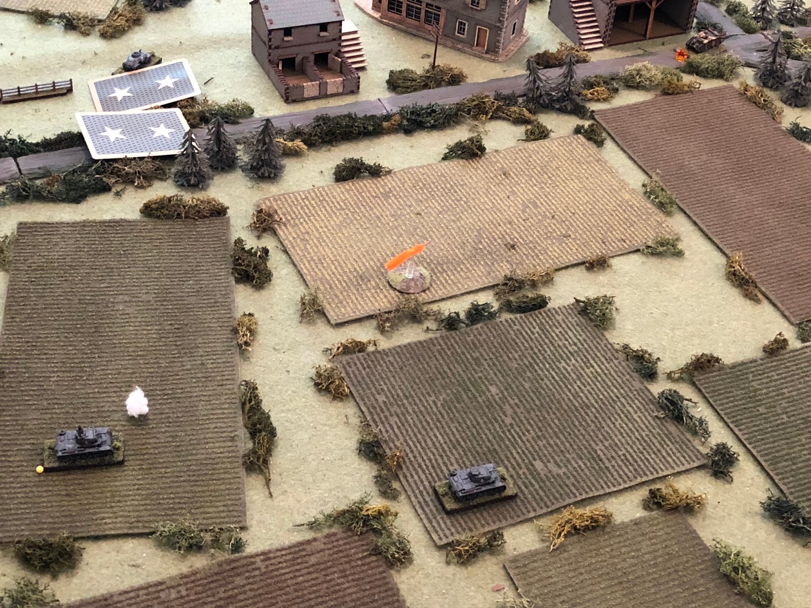  While Sgt Mayer pushes his tank west at speed (bottom centre), looking to get on the enemy tank's flank. 
