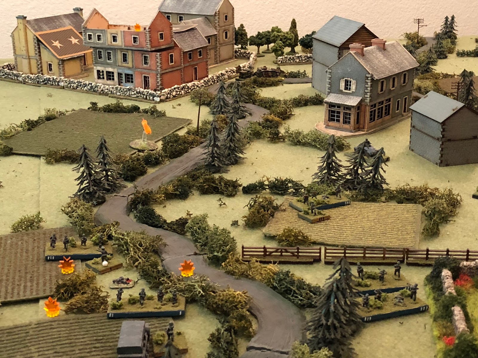  The German infantry slowly manage to get into the fight, with Sgt Lehmkuhl and Sgt Kamphaus' squads (bottom left) opening fire on the ville (top centre left)... 