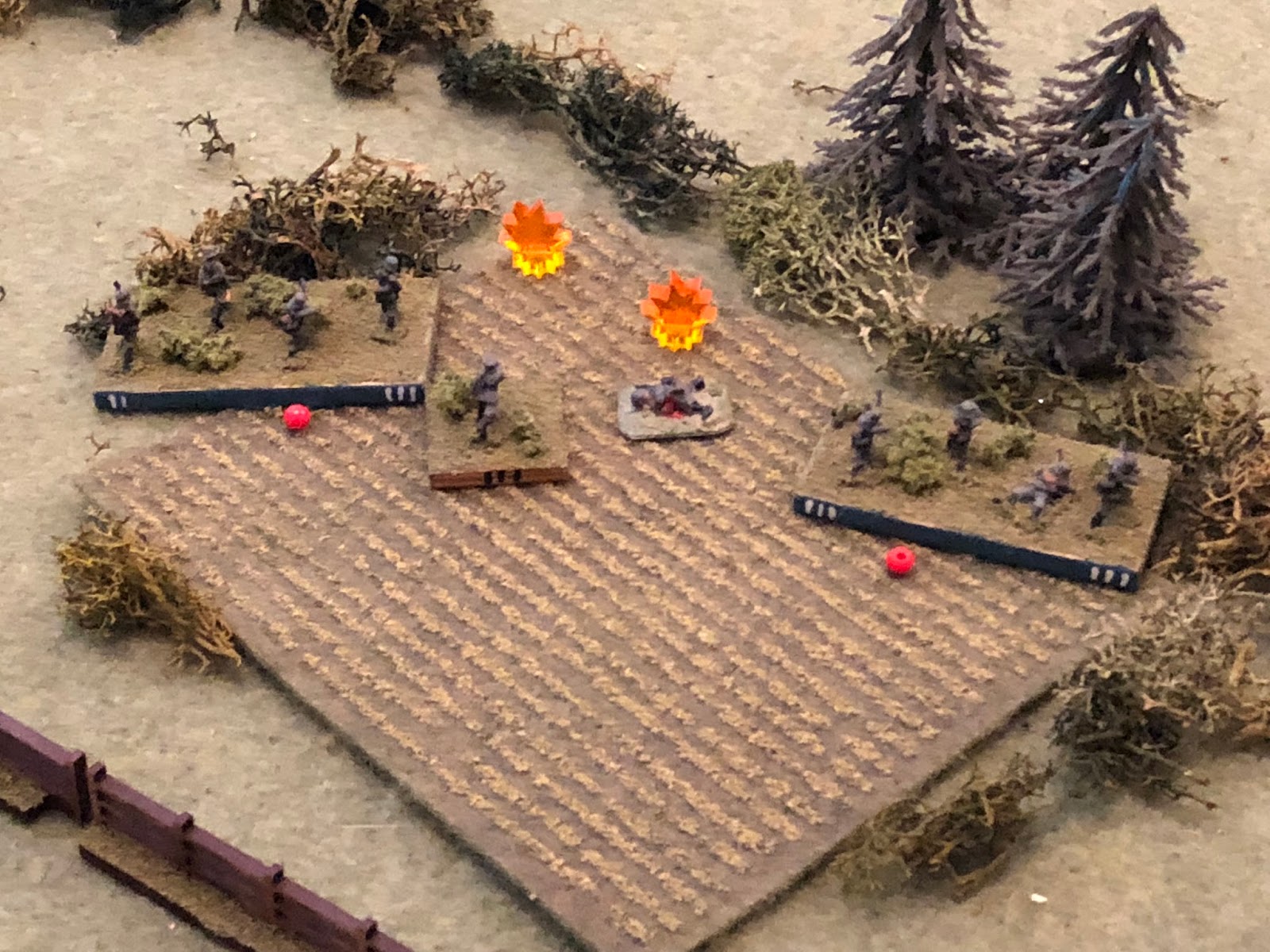 And the fire is vicious!&nbsp; Sgt Imhofe's squad is eliminated, while Sgt Kandler and Cpl Rishel's squads are both suppressed!  *Ouch!&nbsp; Good dice, but helped by the fact the French were firing down on the Germans, who were essentially in the o