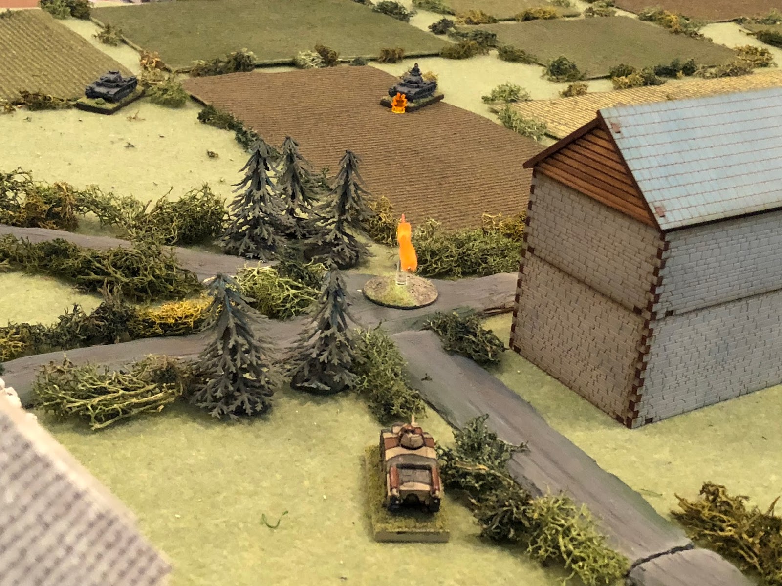  And as they do, Sgt Guillaume pivots his tank left and fires on Lt Loeb's Panzer III (top centre)... 