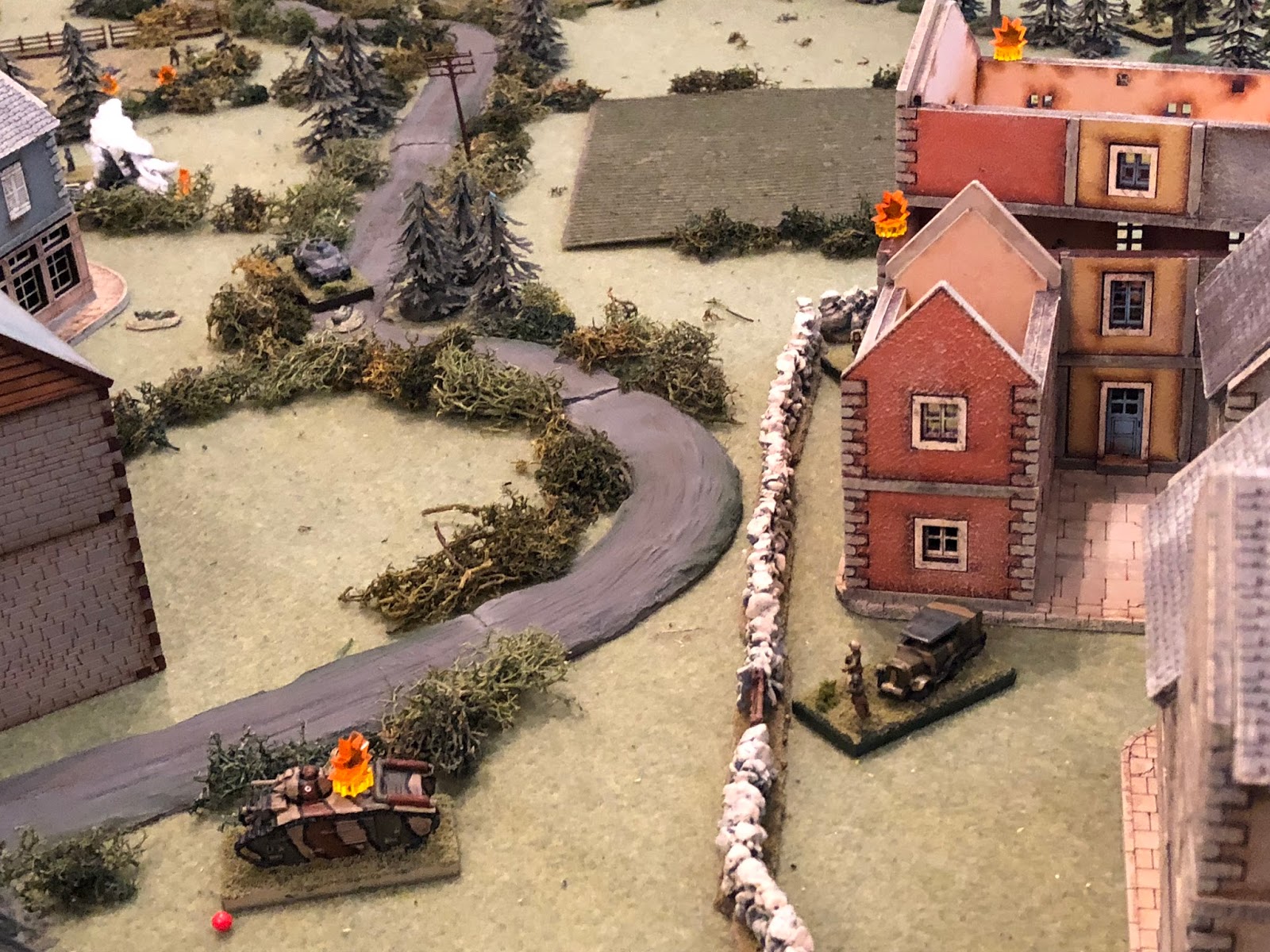  Major Renaut (bottom right) looks on as the German infantry are pounded (top left).&nbsp; 2nd Platoon and the machine gun (top right) are holding strong, the anti-tank gun (behind the buildings at right) is being re-posititioned; I just need to get 