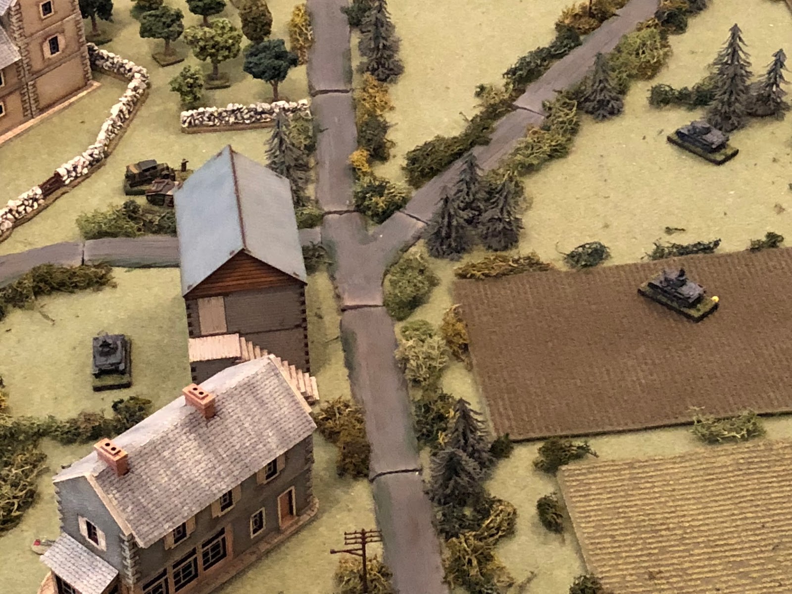  But then SSgt Mangold has a eureka moment!&nbsp; Lt Loeb (far right, with Sgt Mayer's tank above him) curses aloud when he sees SSgt Mangold's Pz IV suddenly pivot left and turn off the road.&nbsp; "Damn you, Mangold, get in the fight!"&nbsp; He rec