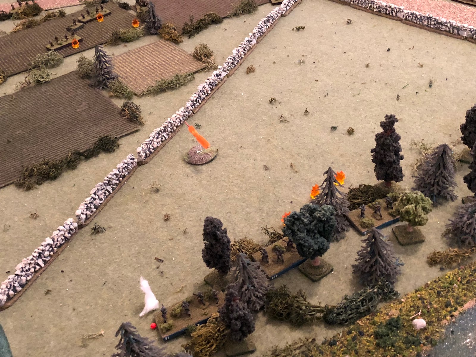  And as that is happening, the German Motorcycle Platoon (bottom centre) ups their fire on the French 1st Platoon (top left).&nbsp; Well, 1st and 2nd Squads, anyway; Cpl Wilhelm's 3rd Squad red bead at bottom left) tries to rally). 