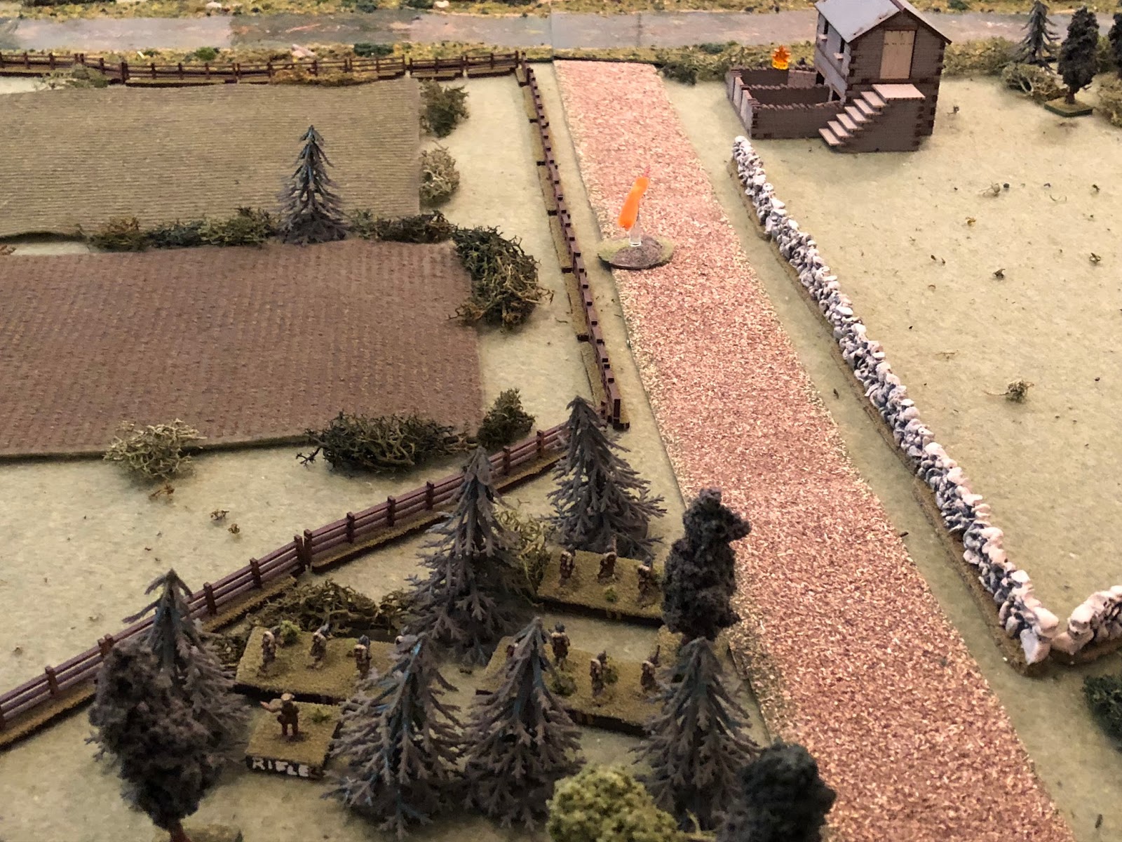  In the center, the French 2nd Platoon (bottom center) continues its advance, again firing on the German engineers at the tollkeeper's house (top right), but the Germans are no worse the wear for it. 