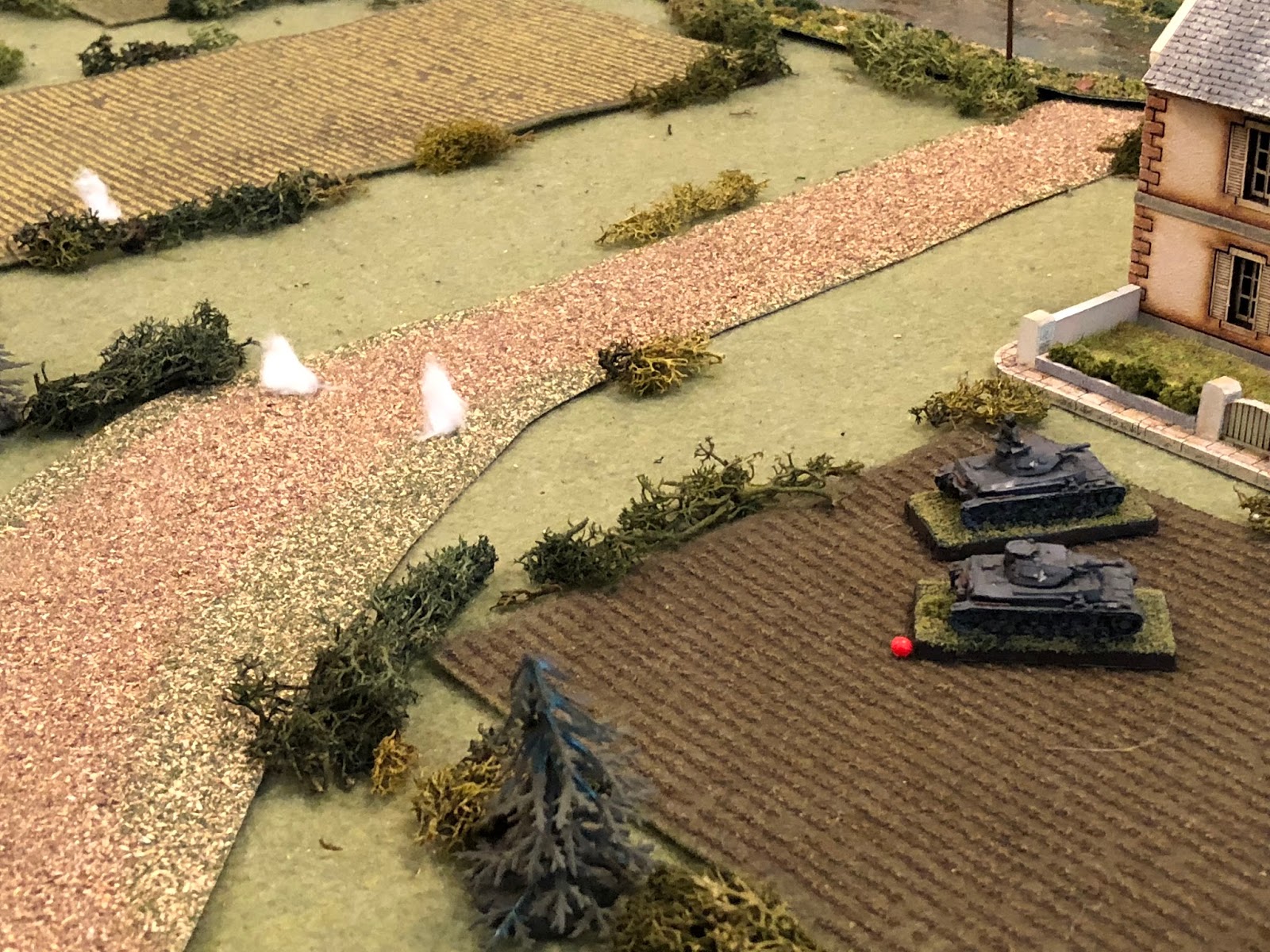  And it's enough to force Sgt Kapps to move his tank to shelter in the lee of the French house, right next to Sgt Graebner's vehicle, which had the exact same thing happen! 