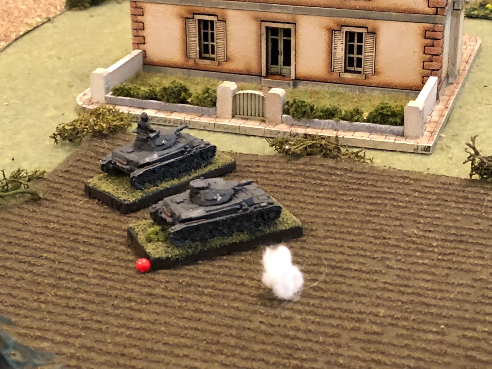     The enemy shell plows the cabbage field at Sgt Kapp's right flank. 