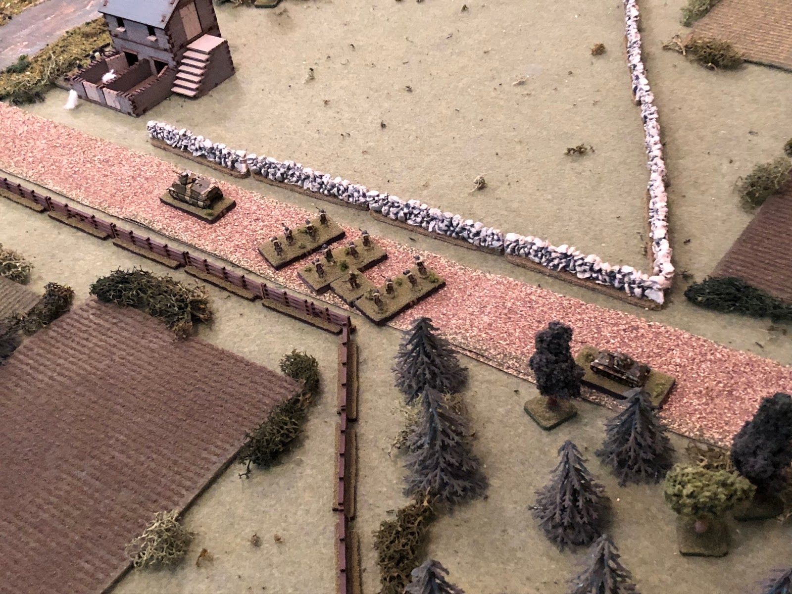  ut while that's going on, the French 2nd Platoon commander kicks his men in the rear and gets them double-timing east down main street, pulling up behind the Somua.   
