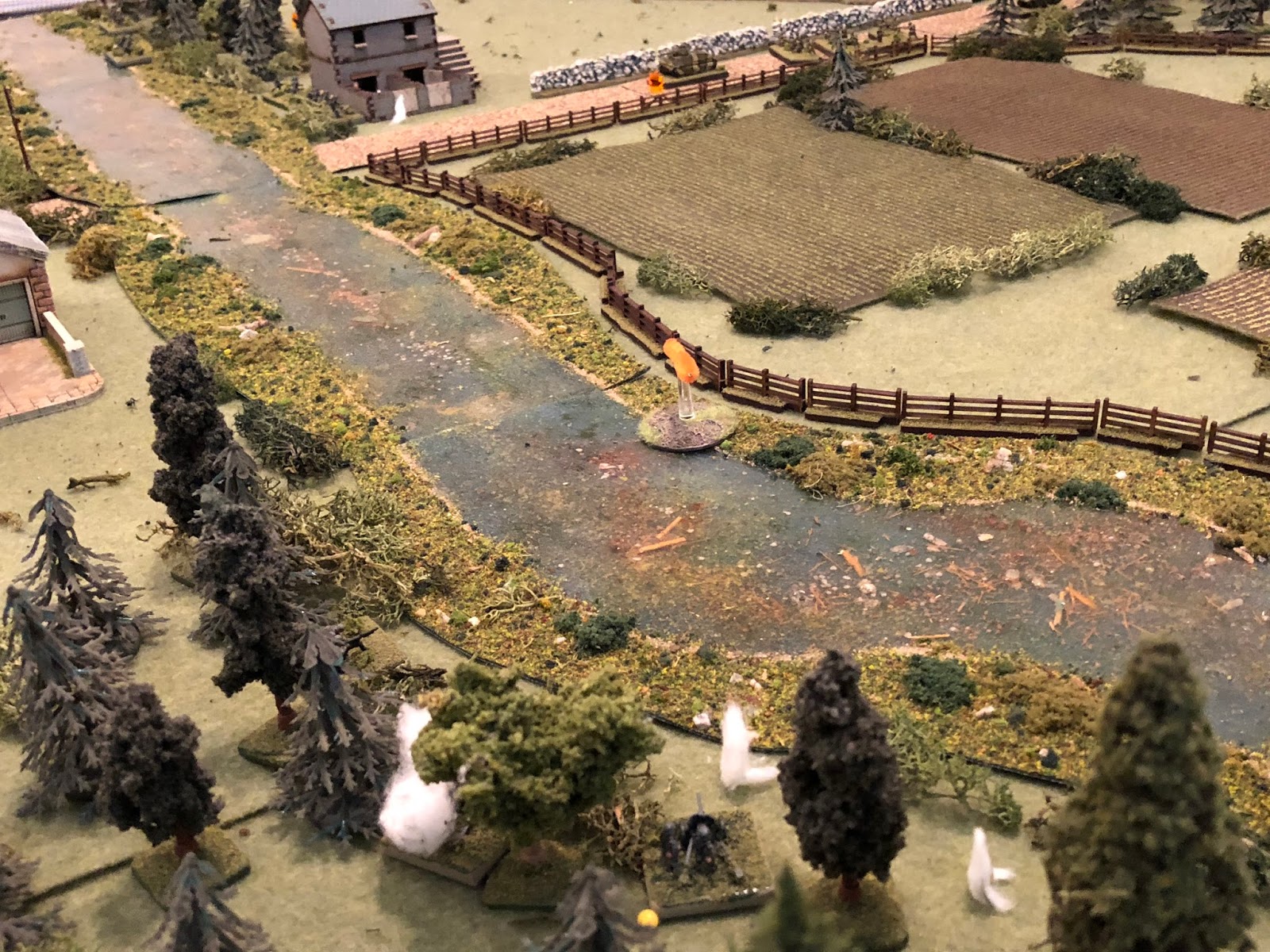  Sgt Kallenbach (bottom enter), having knocked out one enemy Somua already, turns his 37mm ATG on the other (top center), currently leading the French 2nd Platoon east down main street.&nbsp; "Fire!"&nbsp; The stoic German gunners fire on the exposed