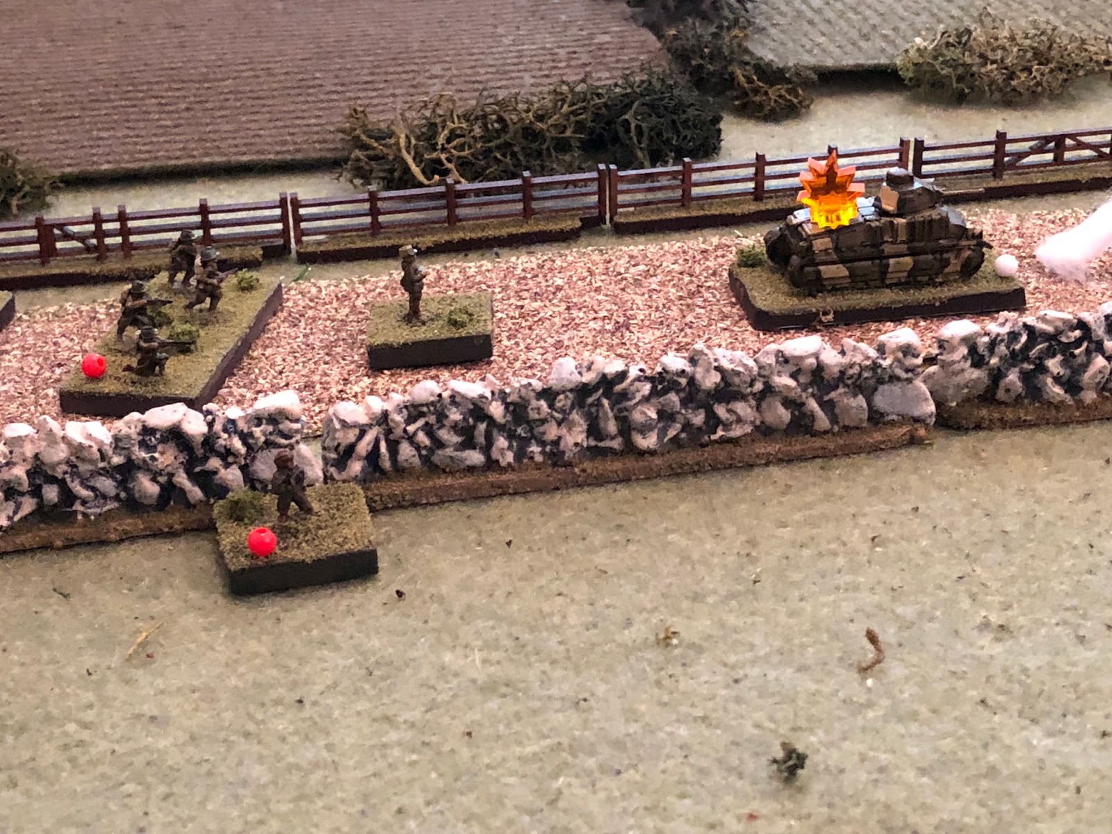  The French 2nd Platoon commander (center) is screaming at the bailed out crew to re-man their vehicle, but they are in no mood!&nbsp; The tank commander makes a vulgar gesture at the French Lieutenant, then he and his crew hop the wall and begin mov