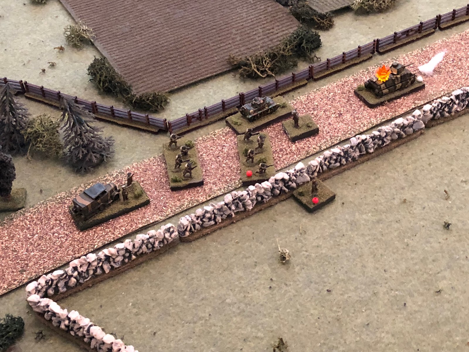  The French H39 light tank begins moving east down main street, skirting left (center) around 2nd Platoon. 