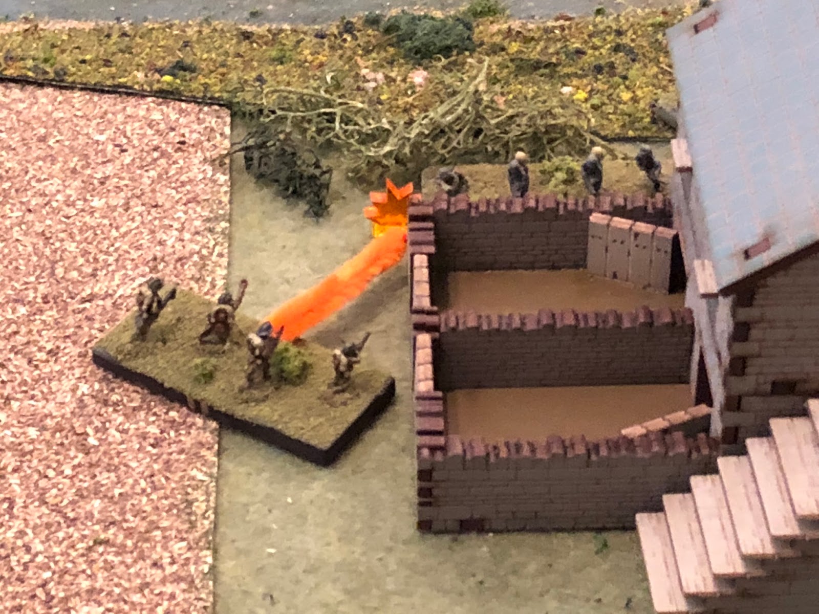  1st Squad pops up and cuts loose with a brutal fusillade at point-blank range on the German engineers...   