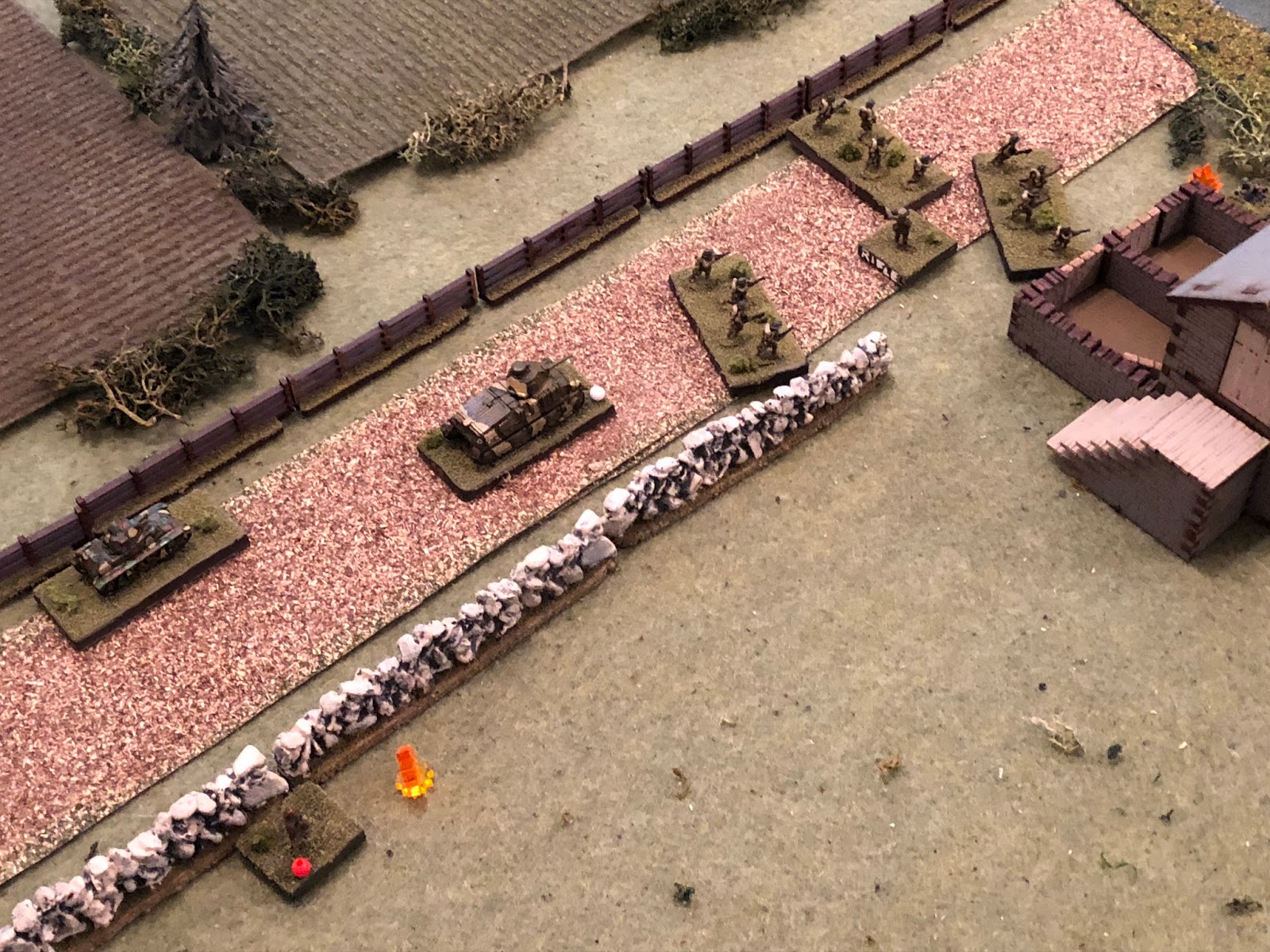  The French 2nd Platoon, looking to press their advantage, push east down main street (top center/right), looking to eliminate the German engineers, take the tollkeeper's house, and push across the ford. 