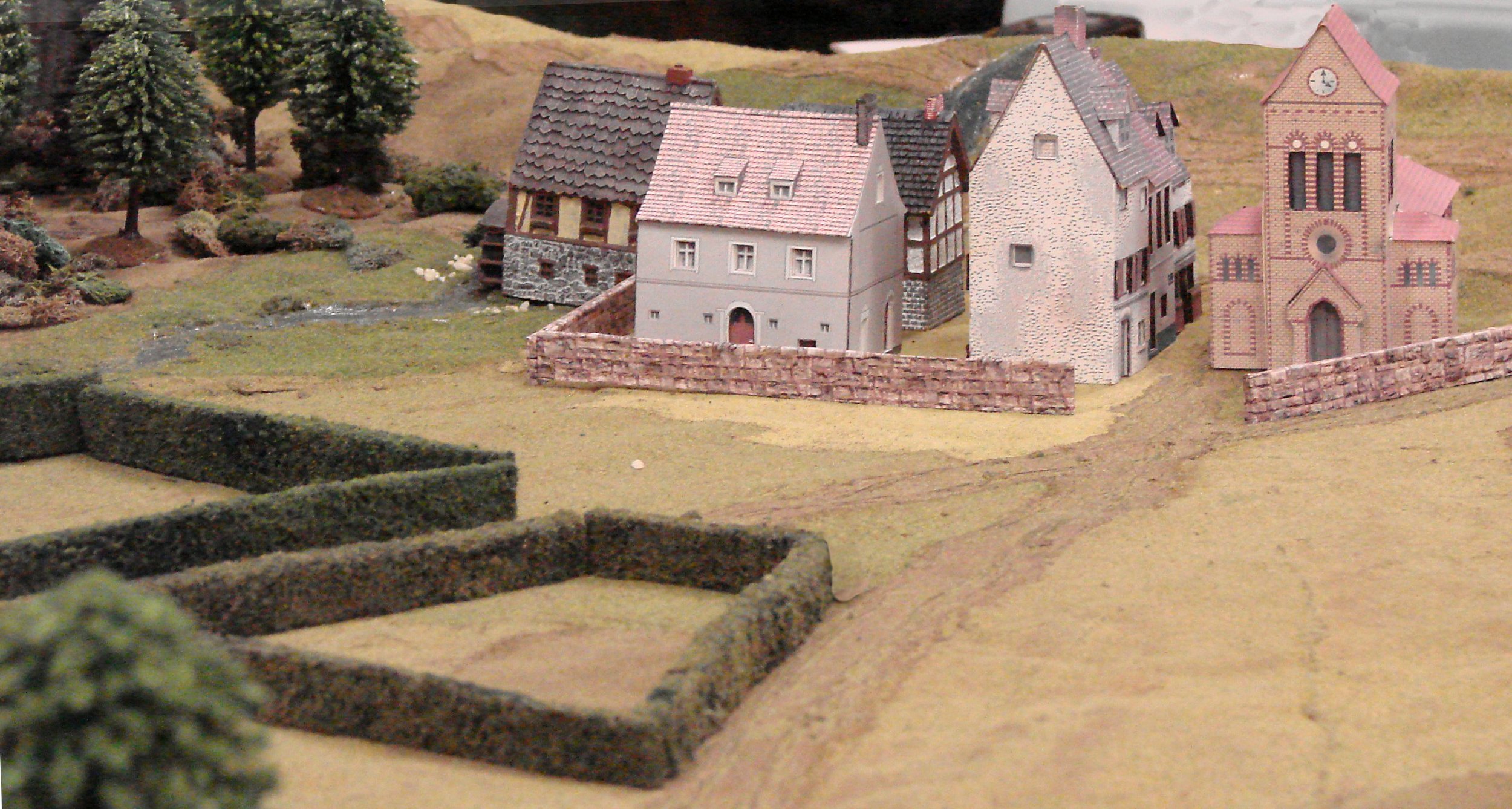 In the rear of the American position, hedged fields provide cover for a fall-back position, and a small village becomes company HQ.