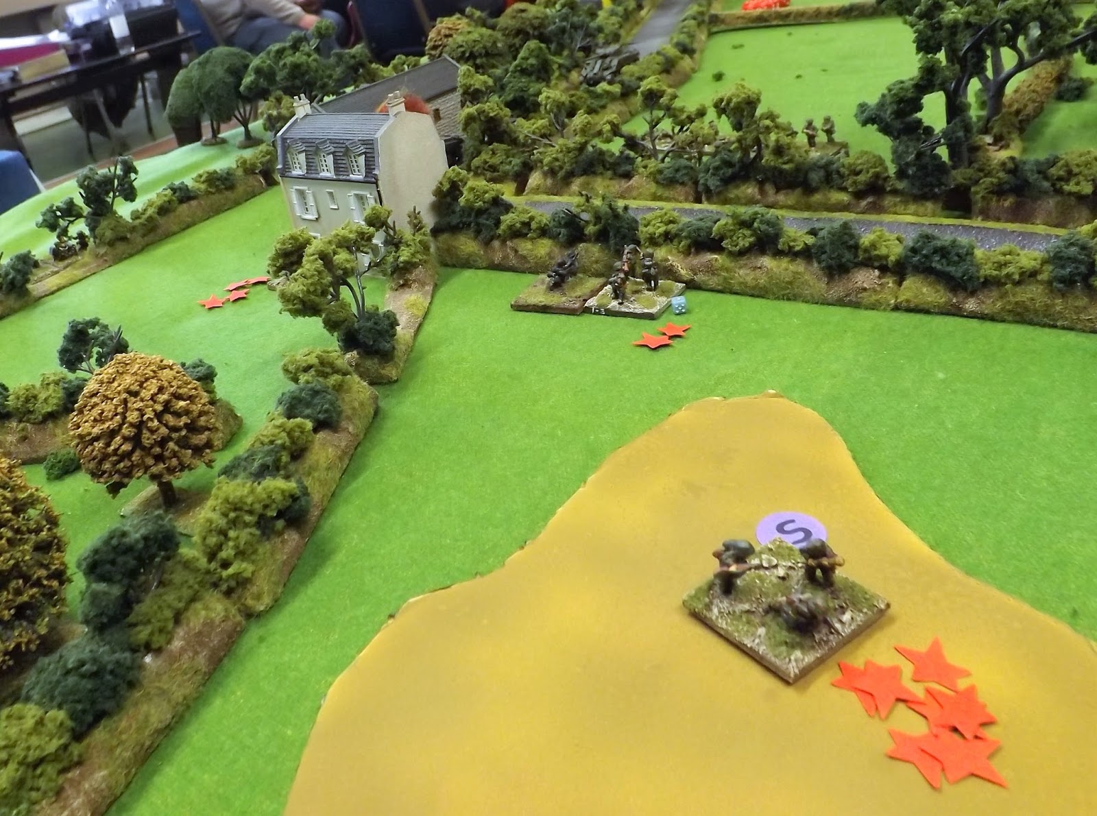 The battle is over at Ferme Valle and German survivors attempt to escape across the muddy pond to their rear