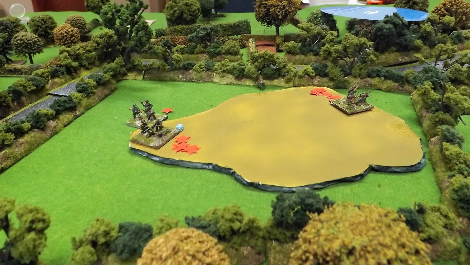 SS Panzergrenadiers vainly attempt to get back too the hill top but are cut down by following British infantry
