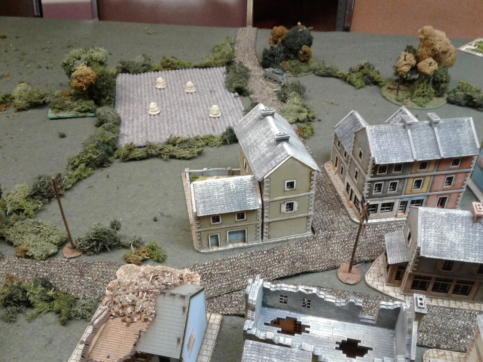 Canadians attacked from the left and tried flanking move through field at top