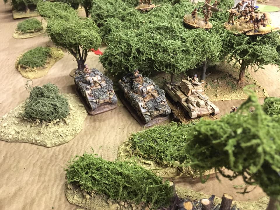  The other British Sherman troop emerges from the vast array of olive groves that covered the hillside below the olive oil factory.   