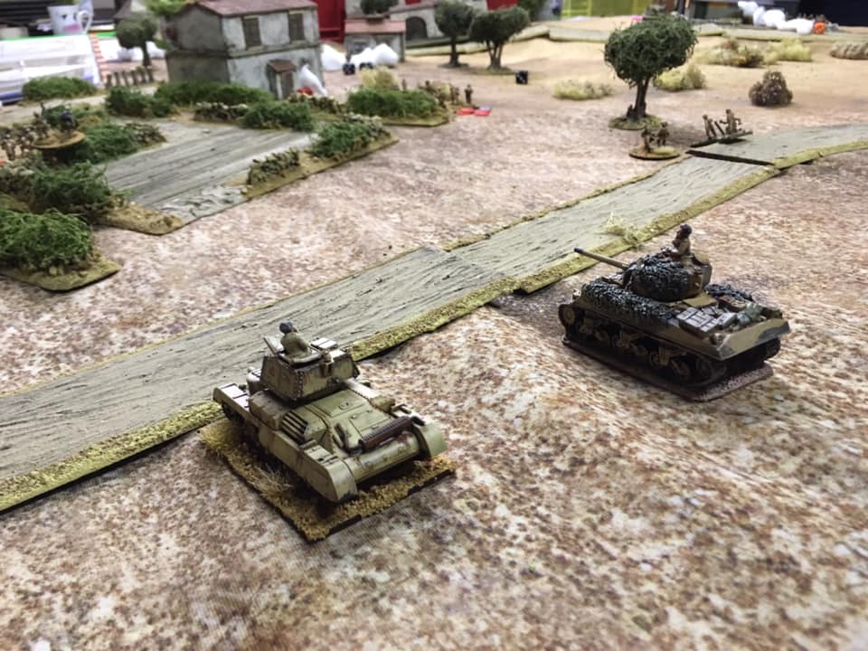  A British Sherman tank troop advances through the valley towards San Marco.   Observers will note the A10 being used as a temporary Sherman! 