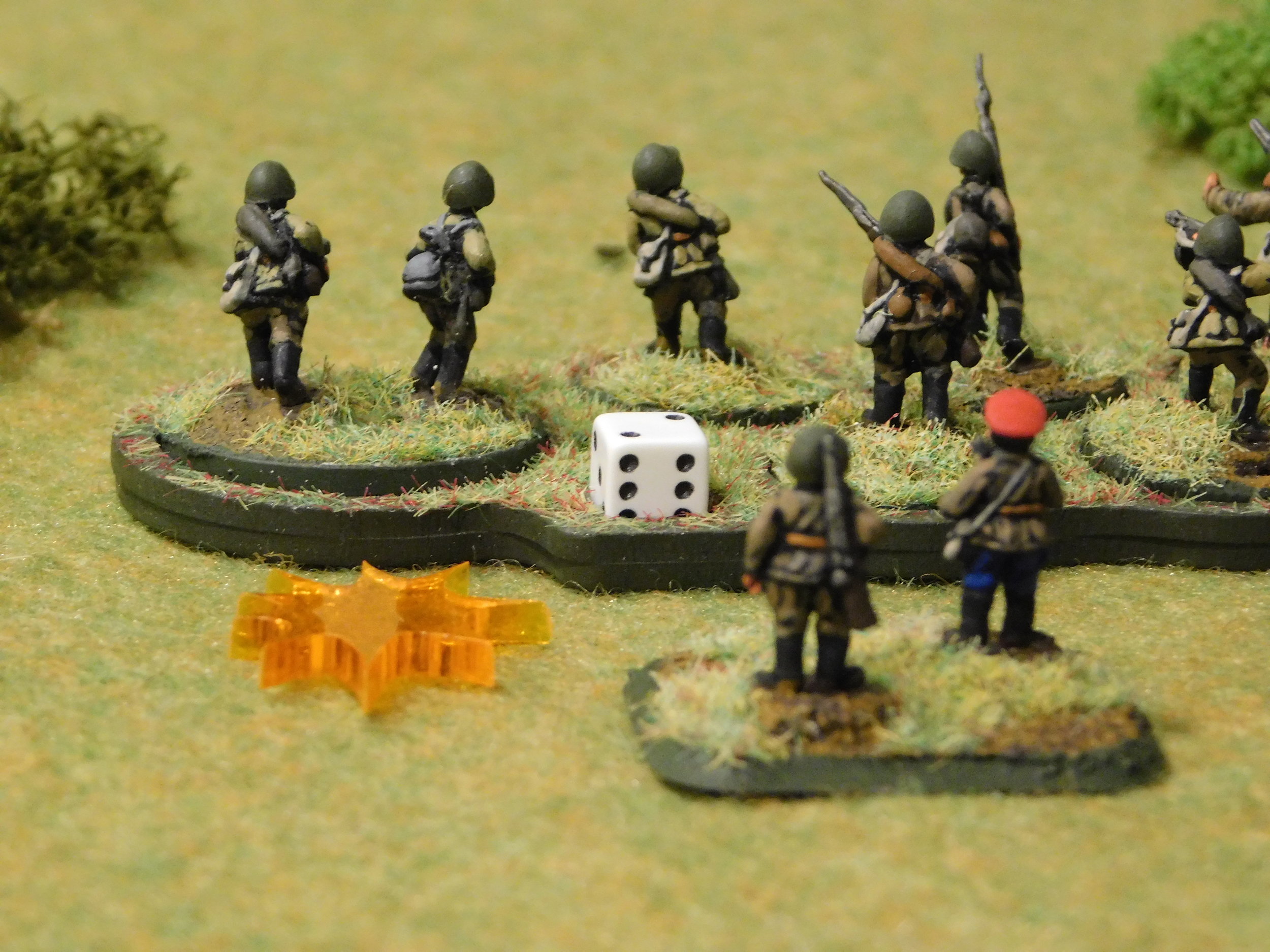 Commissar looks on as Russian troops are Pinned down