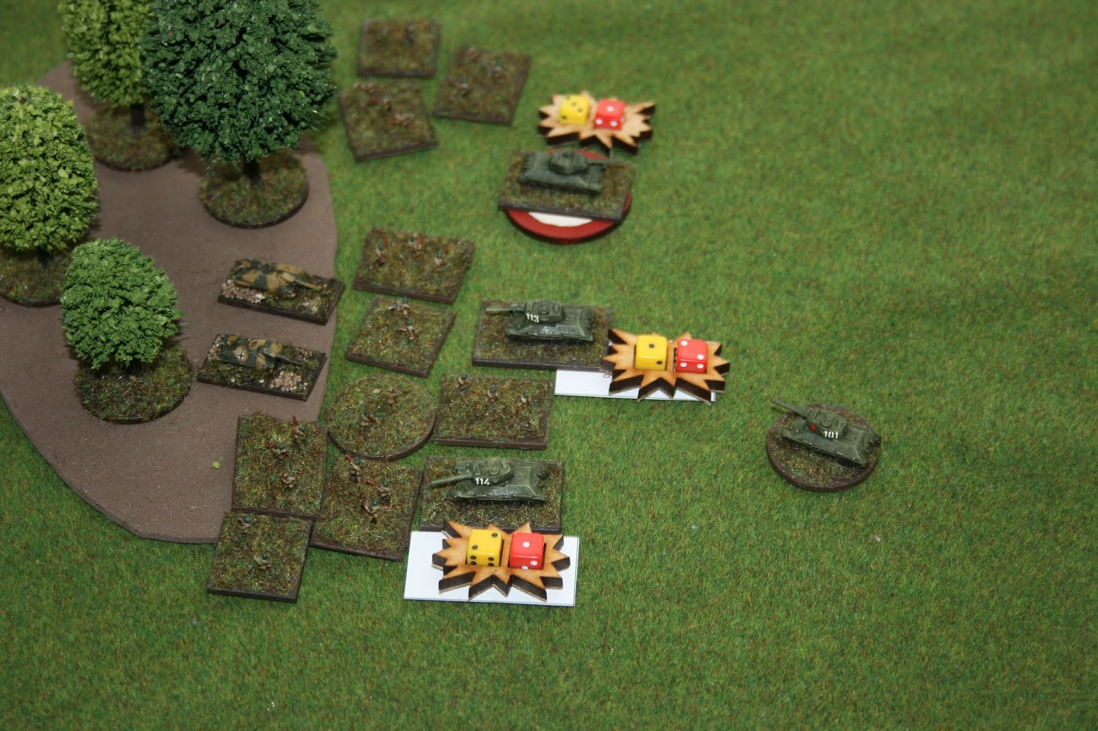 Trying out a new system for tank damage - yellow dice for shock and red dice for number of Actions remaining next turn (a common thing in IABSM). Chits explain nature of damage. It's a bit messy, so maybe a return to pen and paper for those details?