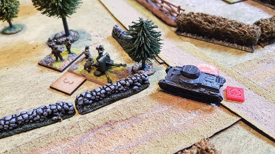  Despite knocking out one tank, the second AFV has its gun damaged but tries to overrun the 2pdr, but is halted by the AT crew just feet from the gun. A last minute reprieve but it blocks the gun's view. 