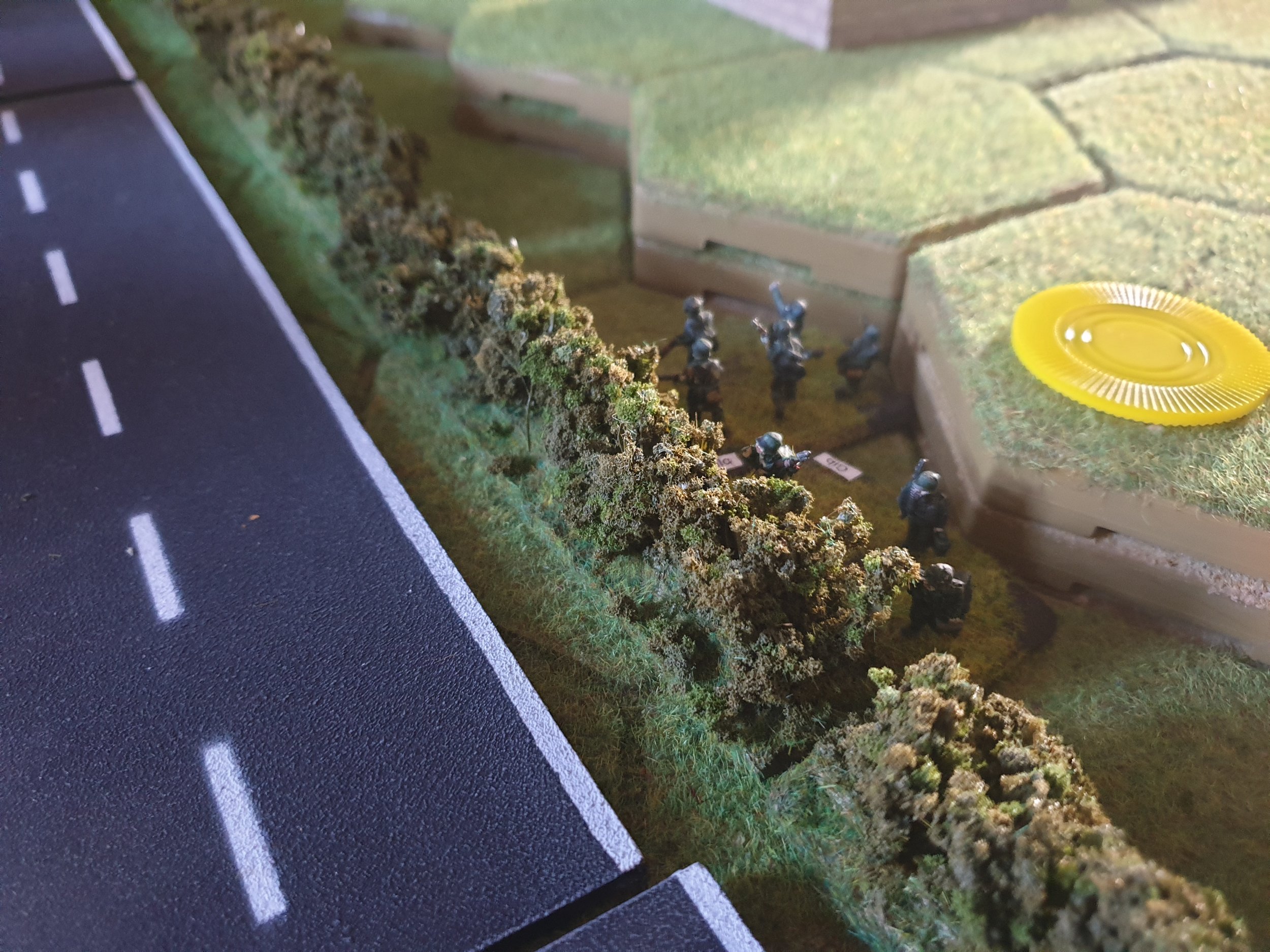2nd German Squad carefully moving back to village.