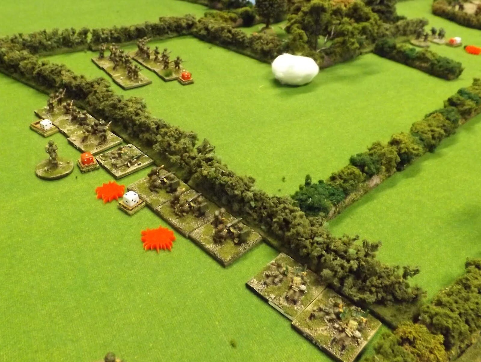 The covering fire goes in as the flank advances