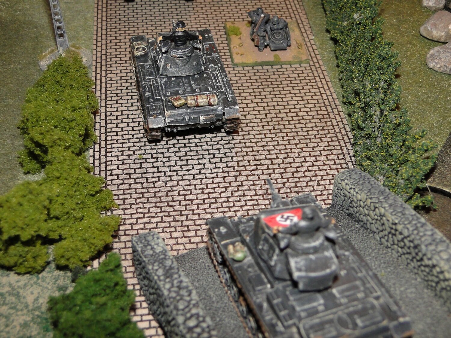 Confidently the Panzers advance along the main road