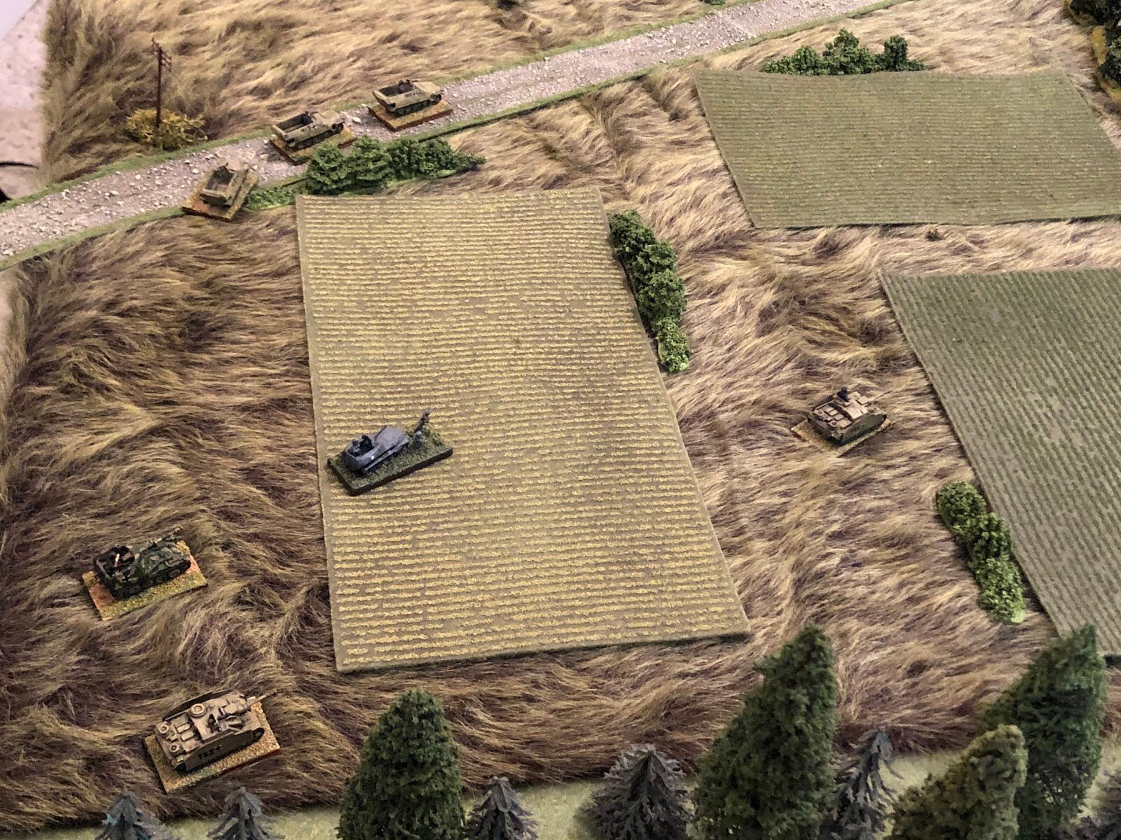  But the Germans have spotted the Soviet armor, and so the Stug platoon commander moves his vehicle up (right, from bottom left)... 