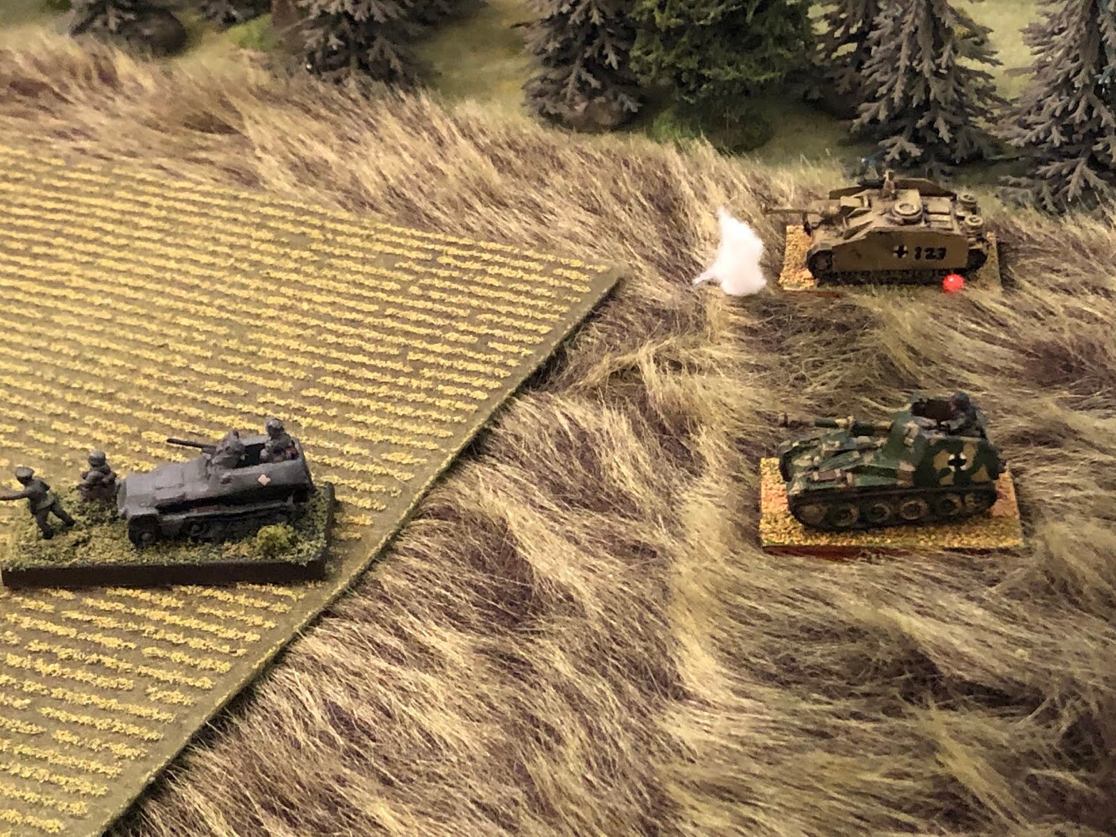  While a third round is just short of the other Stug (top right), suppressing the crew! 