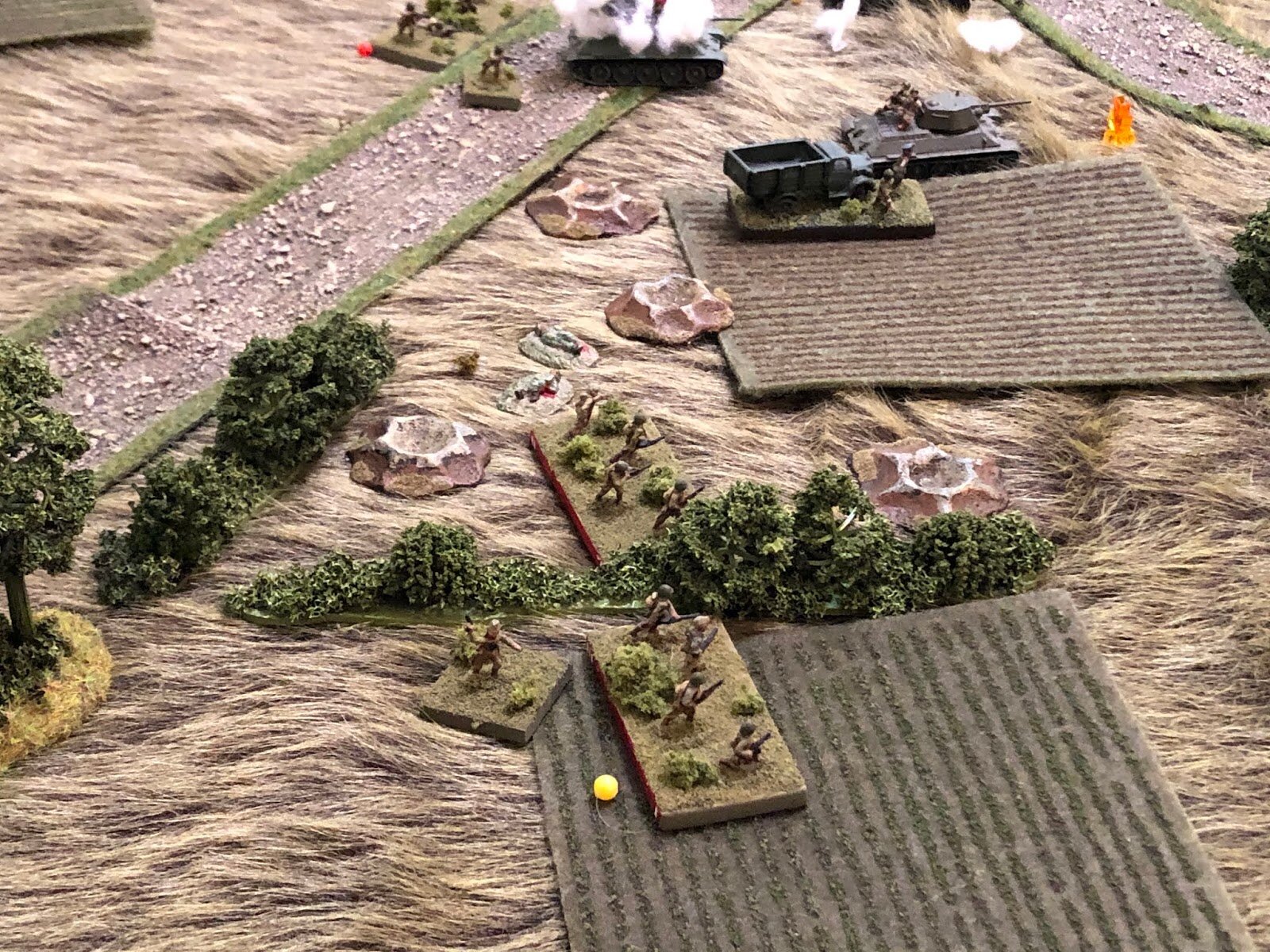  In the center, the Soviet commander of 1st Platoon moves over, under heavy fire, and rallies his last pinned squad. 