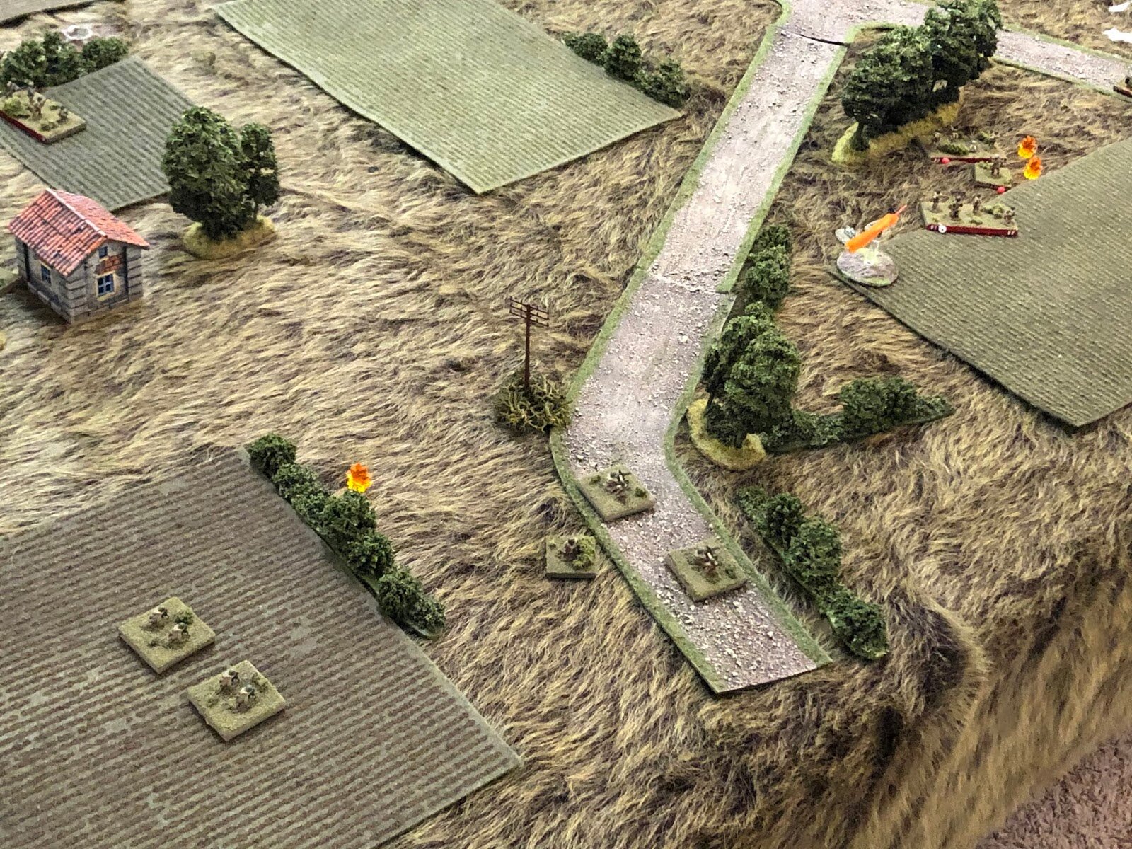  In the southwest, the Soviet light mortars remain in place (bottom left) as their PC leads the two MG teams forward (center bottom), looking to find new hunting ground now that the objective is practically empty and the German halftracks are moving 