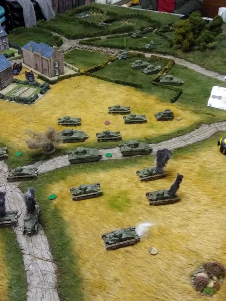  D Coy advance , ranging shot by 105mm artillery at the front.   