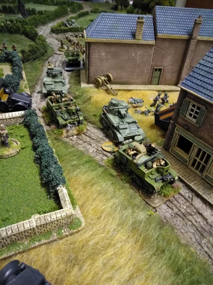  8DLI Carrier section supported by 7RTR Vickers Light Tanks burst into Wailley. The infantry couldn't stop them and was crushed under the tracks of a Vickers Light Tank.    