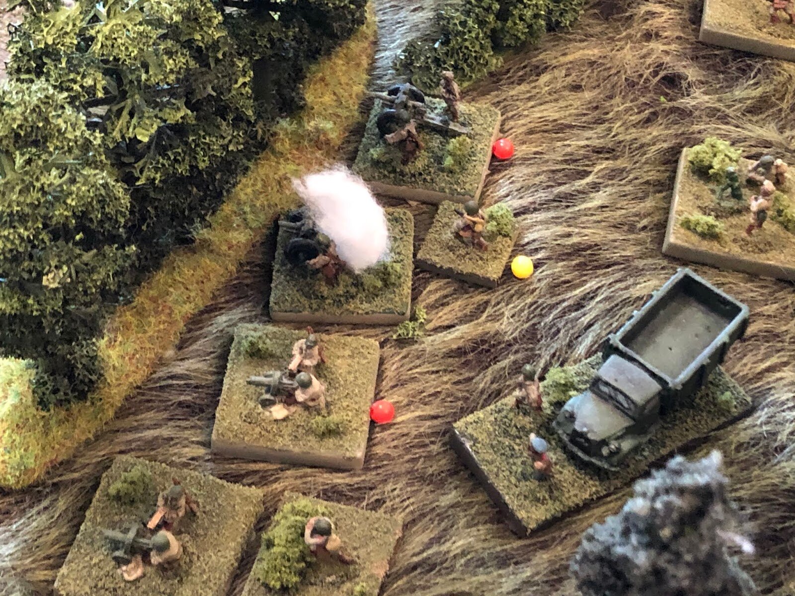  And it's ferocious! One Soviet gun is knocked out, another is suppressed, a nearby MG team is suppressed, and the Infantry Gun Platoon Commander is pinned!  *Wow, the German heavy weapons are off to quite the ass-kicking start! 