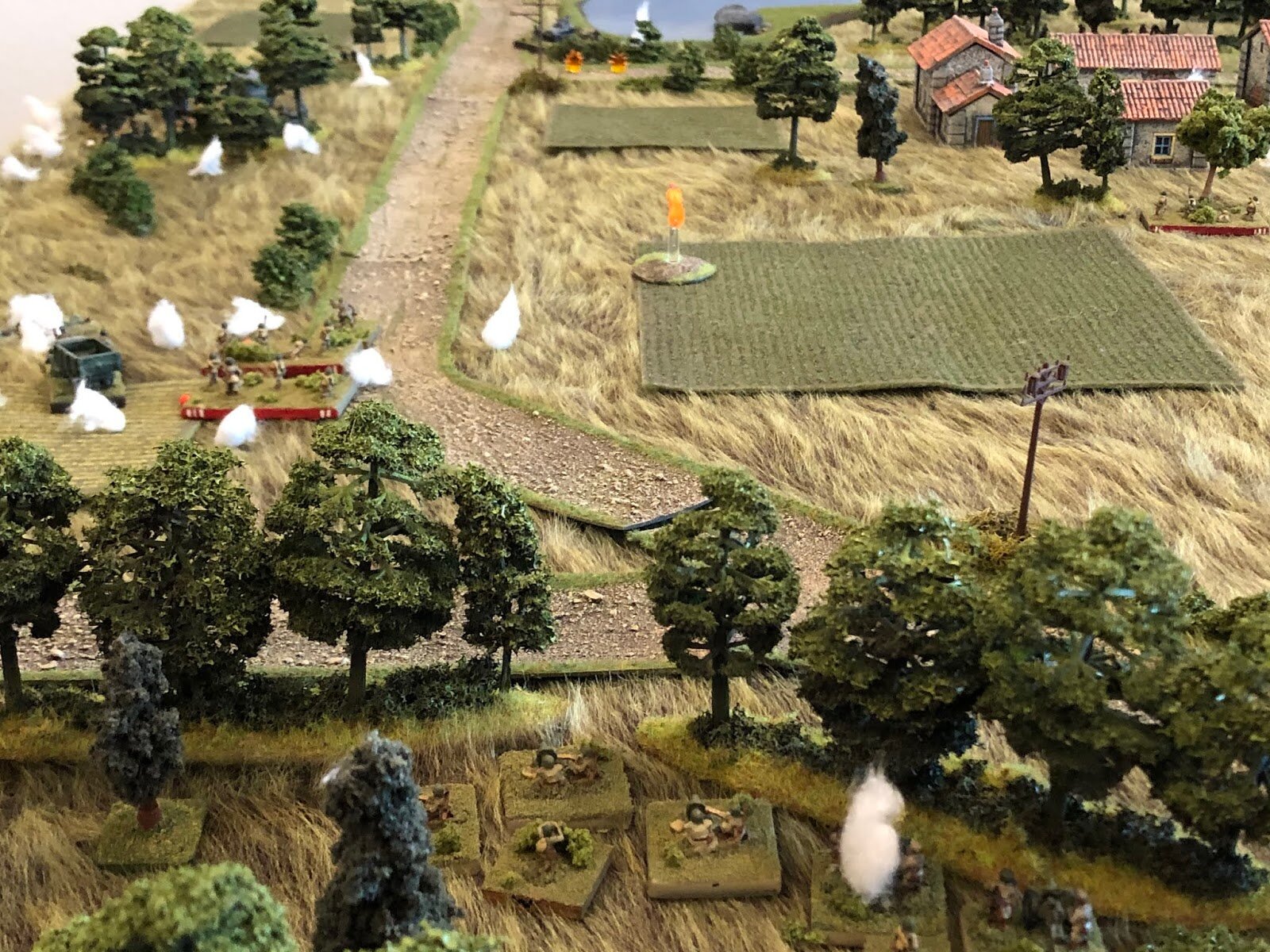  Bust then, as the Soviet infantry are being ravaged (far left), the Soviet MGs (bottom centre) again slap belts in their guns and cut loose on the German Infantry Gun position (top printer)… 