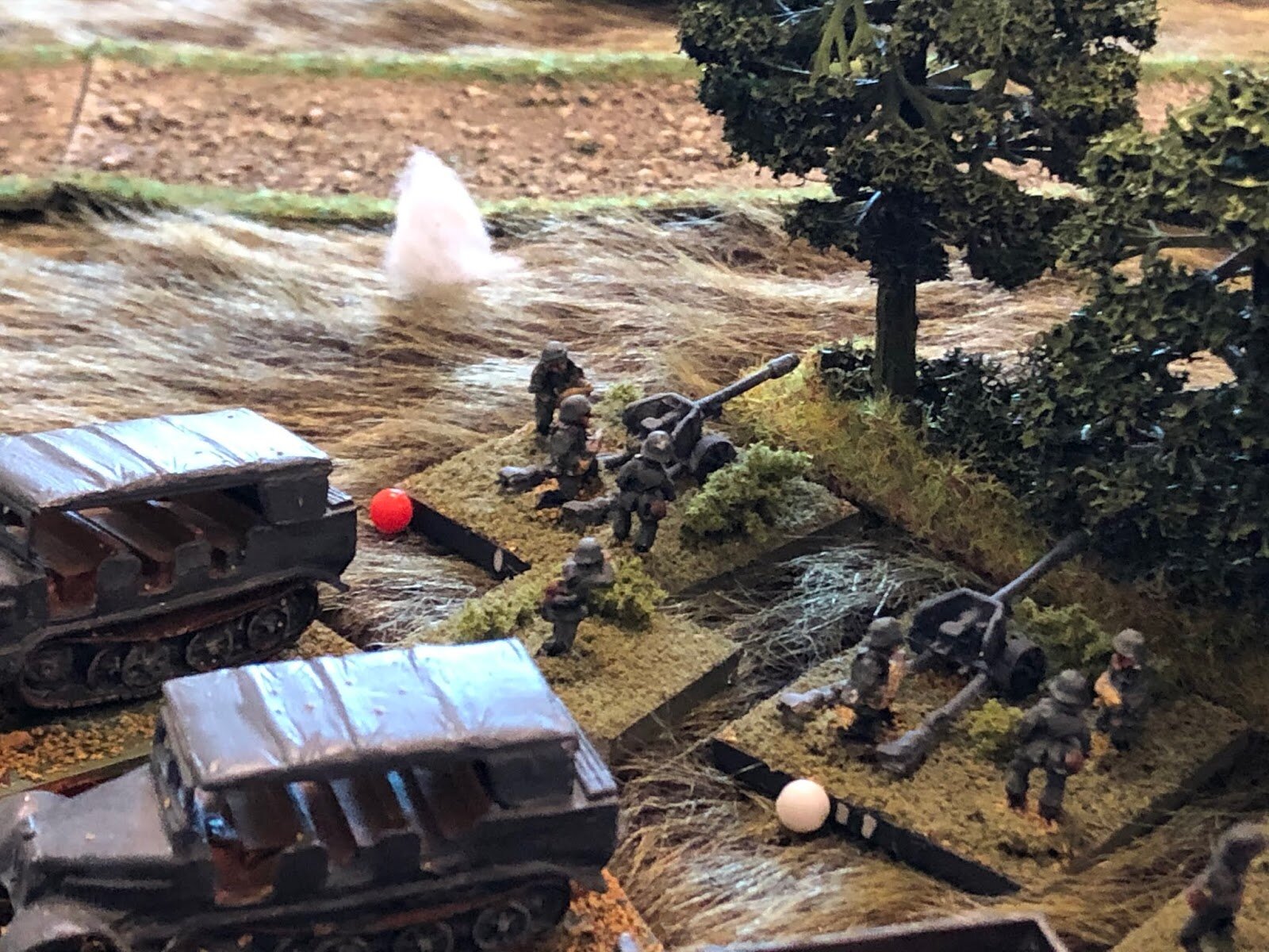  The 76mm HE round crashes in, closer this time, suppressing the crew of Gun #1!  The German Platoon Commander flinches, and quickly does the calculus: I can try to rally those cowards that ran behind me again, or I can try to rally the heroes that h