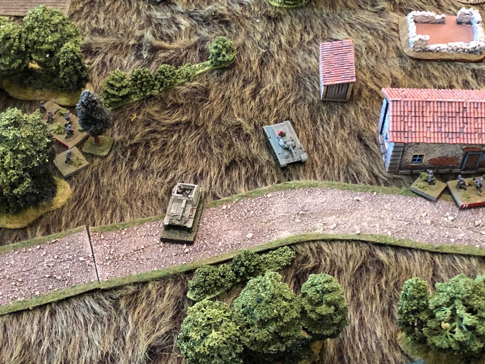  Moving top to bottom, the Soviet T-34 and Su-76 Platoon Commanders know they are in constricted terrain and are absolutely, acutely aware of the threat.  Their heads are up and their eyes are scanning for threats, but they're so focused on the threa
