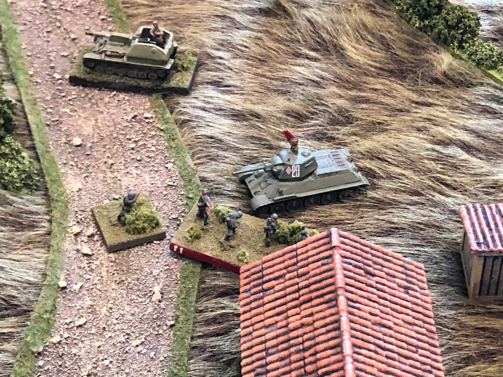  Then leaps to his feet and let’s out a blood-curdling yell for his men to follow him. The German infantrymen rush the 10 metres to the massive Soviet armoured beast, braving fire from its bow machine gun and its commander’s pistol, firing into visio