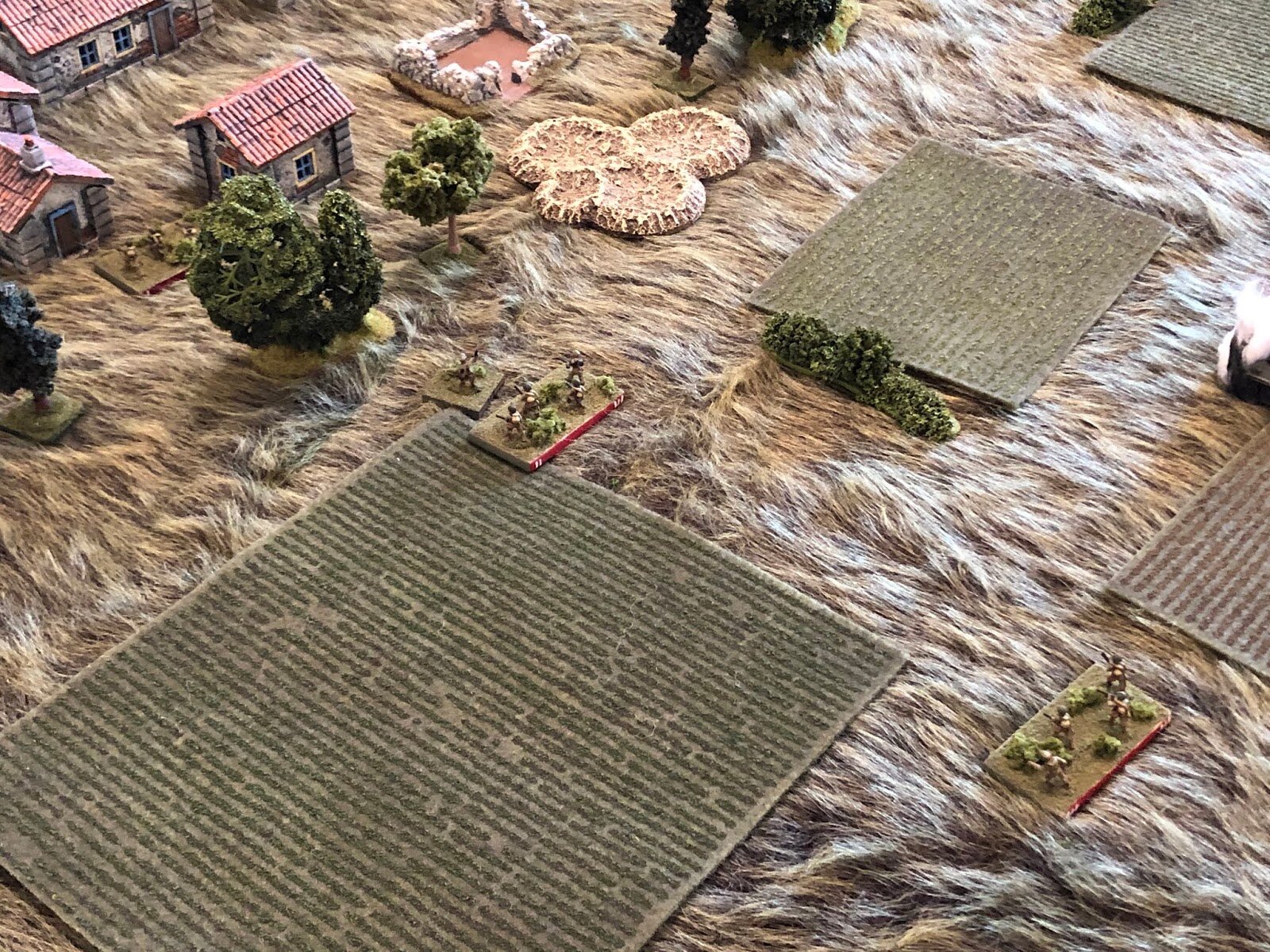  In the center, the Soviet 3rd Platoon Commander leads his 2nd Squad up to the edge of Snava (left, from bottom right, with 1st Squad at top left), as his 3rd Squad looks on. 
