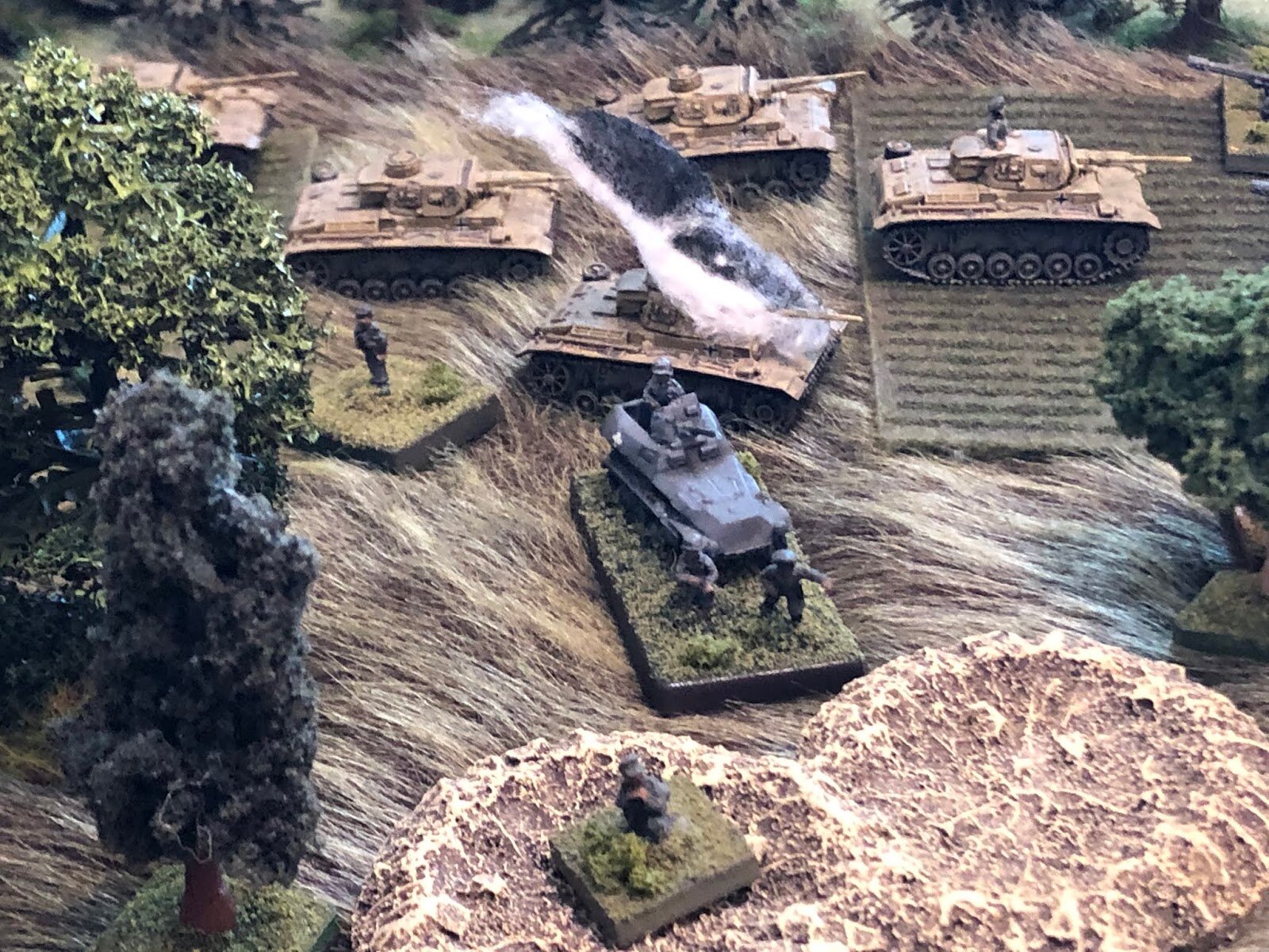  WHAM!!!  The German CO nearly wets himself as the panzer immediately behind him is struck and bursts into flames! 