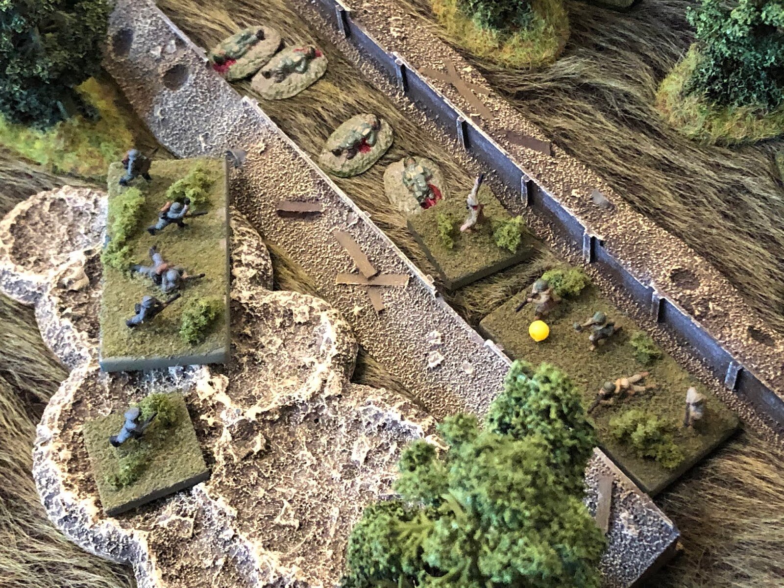  They (left) knock out one Soviet rifle squad, but their PC and last rifle squad fight them to a standstill, and there is a lull as the Soviets catch their breath in the trench and the Germans catch their breath in the craters. 