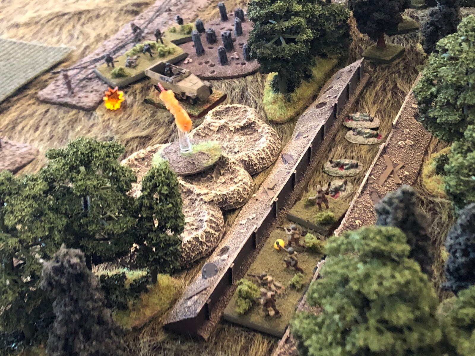  Back at the southwest woods, the Soviet Platoon Commander seriously contemplates close assaulting the German half-tracks and suppressed PC and squad. But he looks at his poor, conscripted boys and decides that it’s probably too much for them, so he 