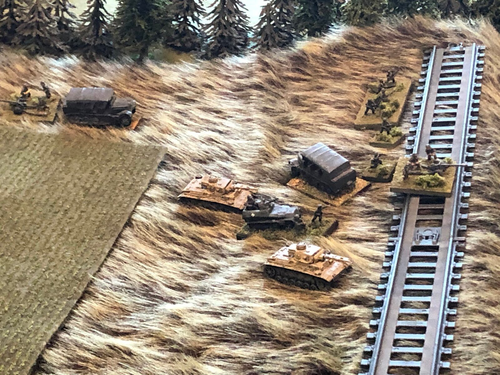  On the German left, the German CO gets involved, moving the ATG Platoon up to the railway embankment, even getting Gun #1 into position and unlimbered (right, with Gun #2 still on the move at top left). 