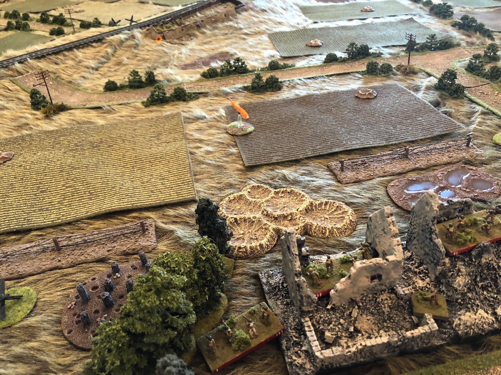  The Soviet 3rd Rifle Platoon, in the Collective Farm (bottom right) begins exchanging ineffectual fire with the German 2nd Platoon, 2nd Company, which has managed to occupy the former-Soviet trench on the railway embankment (top center). 