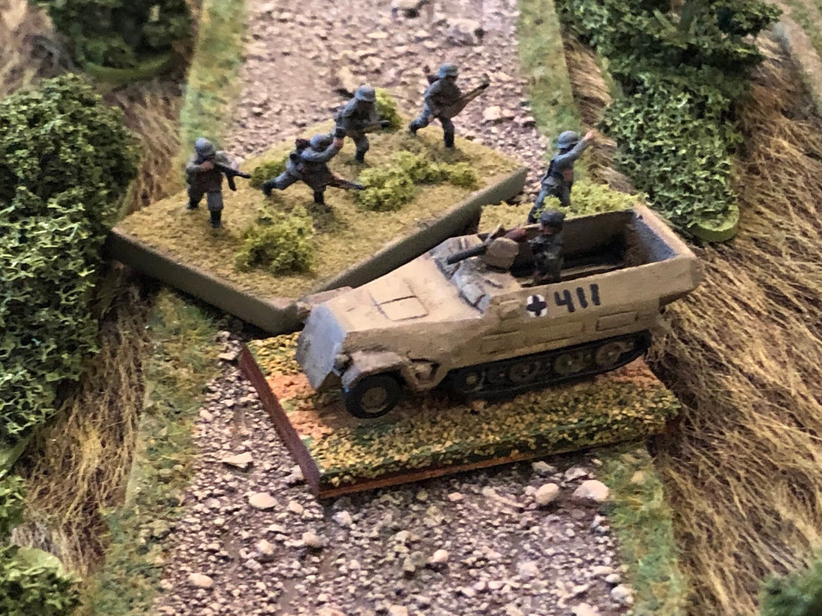  On the German right, 2nd Plt, 1st Co, mounts up in the halftracks. 