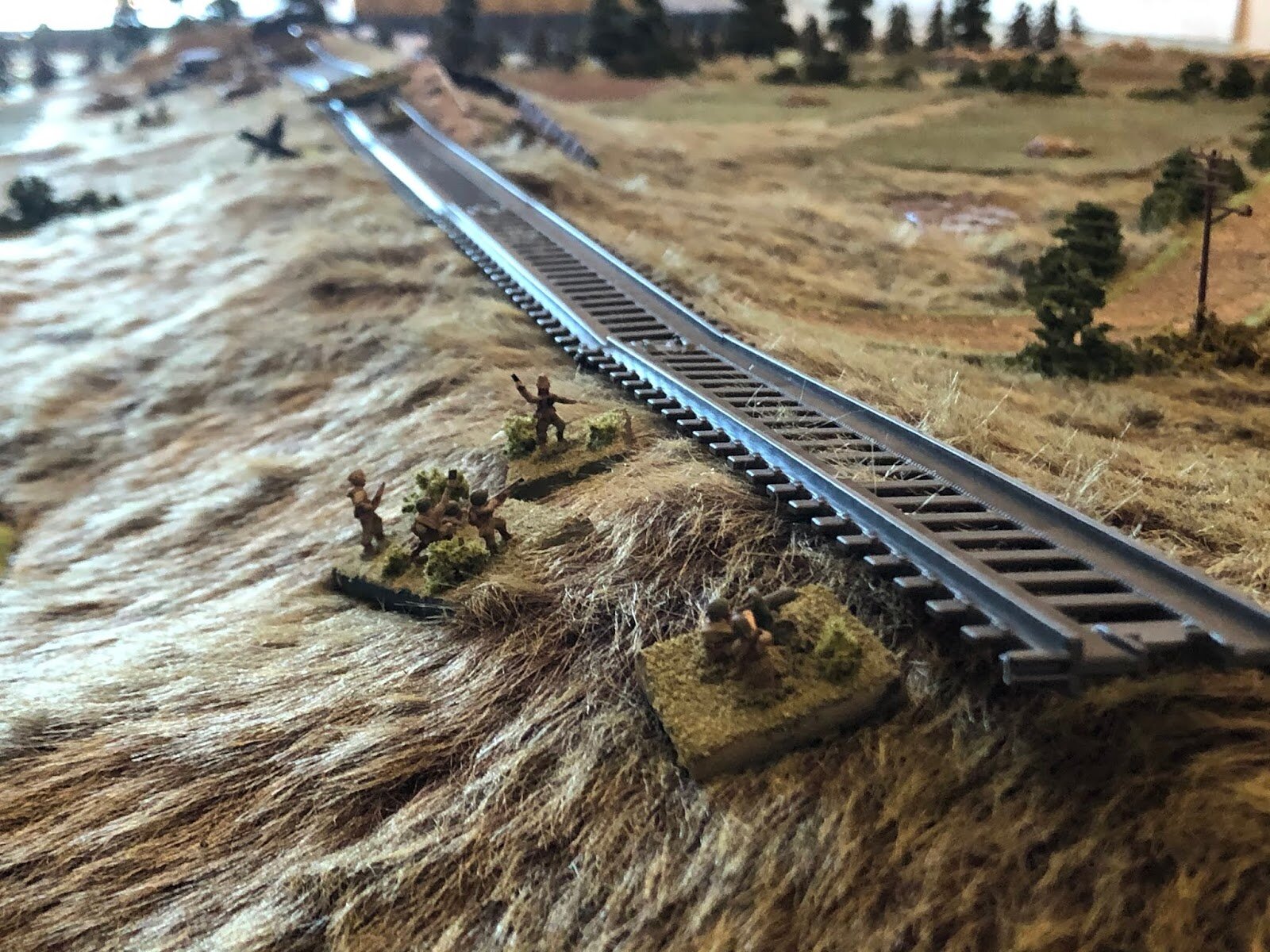  As the remnants of the Soviet 1st Rifle and MG Platoons reach the top of the railway embankment. 