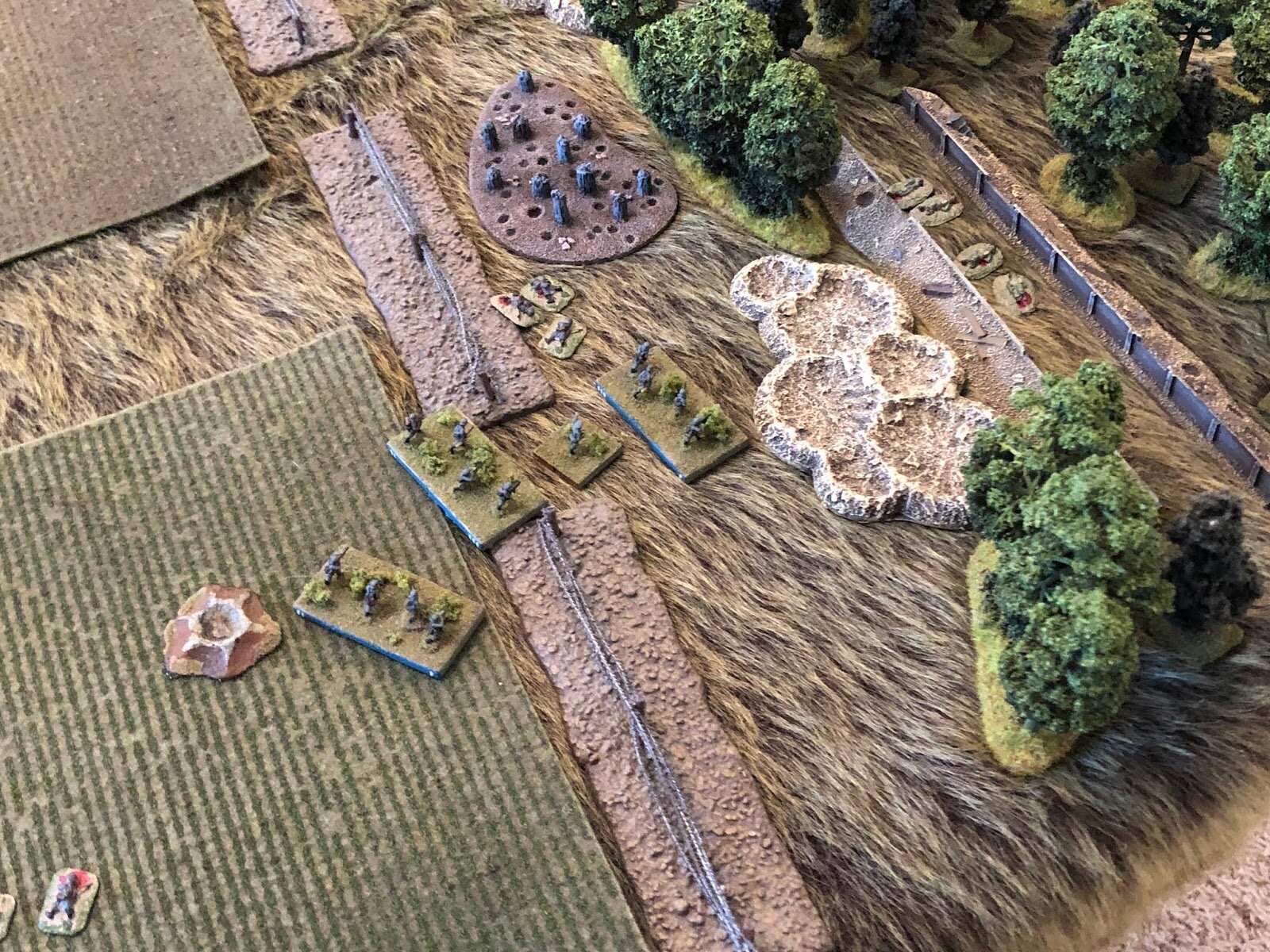  On the German right, the last squad of 3rd Platoon has been folded into 1st Platoon, and they finally get moving, drawing close to the Soviet trenchline in the southwest woods, very tentatively.  
