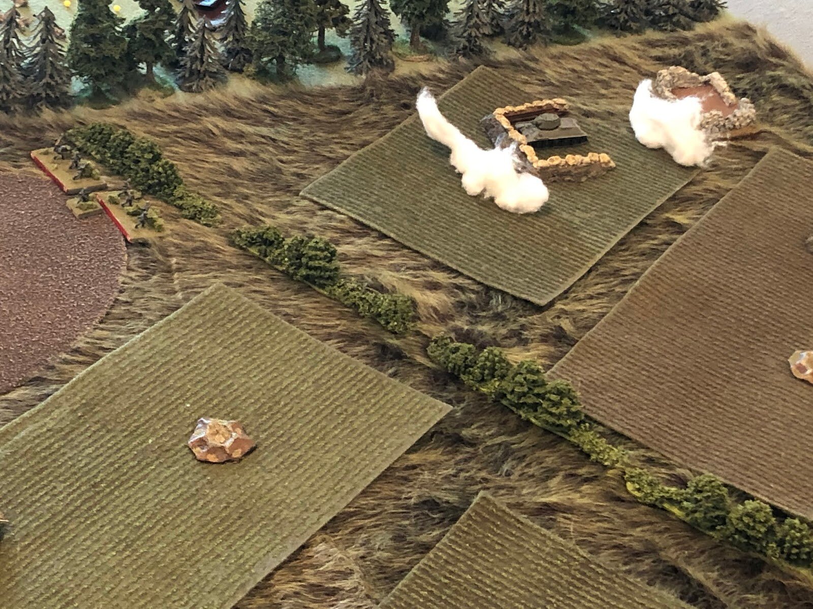  The German mortars fire in support of 2nd Plt, 2nd Co (top left), and this time the smoke is on target, smothering T-34 #2 (top center right). 
