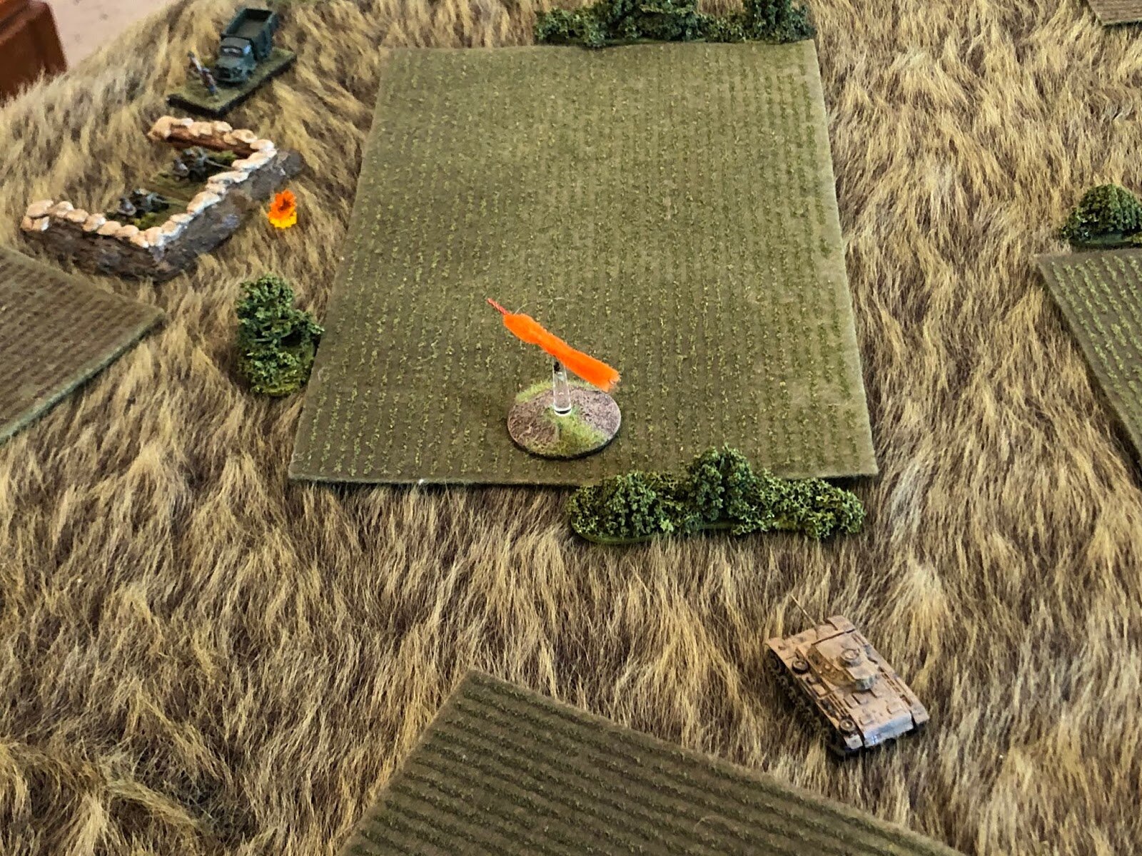 Trying bravely to alleviate the pressure on the left, the 2nd Pz Plt Commander continues pushing his tank straight at the South ATG position, firing as he goes with his cannon and MGs...